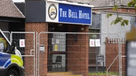 Three men arrested after officers injured at Epping hotel protest