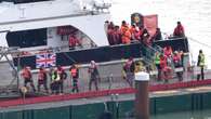 Migrants brought to shore after crossing English Channel