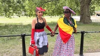 Visitors look the part in special dresses made for VE Day celebrations