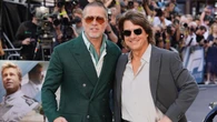 Brad Pitt embraces Tom Cruise at F1: The Movie premiere