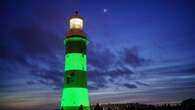 Plymouth lighthouse lit up green in memory of university lecturer