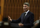 Housing minister mum on development fee cuts despite Liberal campaign vow