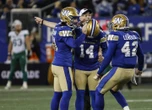 Bombers win ugly to keep playoff hopes alive
