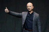 Bidder pays $28M in charity auction to book space flight with Jeff Bezos