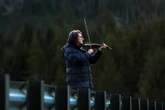 B.C. woman tries to coax trapped orca calf out of lagoon with her violin