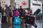 Toronto Pearson Airport warns of delays from Air Canada strike, passengers still stranded