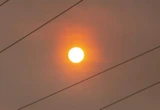 Newfoundland’s largest wildfire gains ground amid dry, windy conditions