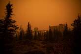 ‘Panic and anxiety’: Western Canada continues evacuations as wildfires rage on