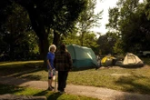 As city looks to clear encampment in Toronto park, residents demand permanent housing