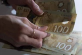 Invest or keep money in cash? 41% of young Canadians opt for latter in TFSA