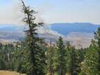 Washington state wildfire burning near border visible from Osoyoos