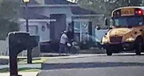Man is accused of aiming sprinklers at students with disabilities waiting for a bus