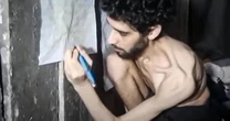 Outcry in Israel as Hamas releases video of emaciated hostage alongside starving Palestinian children