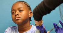 People are finding ways to get Covid shots despite new limits on eligibility