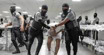Anguished families are losing hope as they can’t reach loved ones sent to El Salvador mega-prison