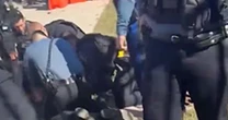 Video shows moments after fans tackle person when shots rang out at Chiefs parade