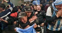 Argentina fans cheer Copa America win, a break from country's economic crisis