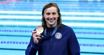 Katie Ledecky wins 1,500 free, tying Jenny Thompson's record for most gold medals by a female swimmer
