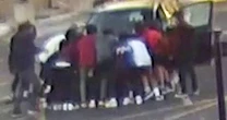 High school students lift car to free mom and her 2-year-old son pinned underneath 