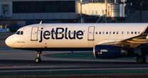 Passenger arrested after allegedly opening emergency door of JetBlue plane on taxiway at Boston airport