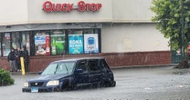 Intense storms batter Northeast and cause severe flash flooding, submerging cars and prompting water rescues
