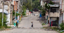 Armed men in Haiti’s capital seize a top security official in rare high-level abduction
