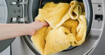 Here’s how often you should change your towels, and when to throw them away, according to experts
