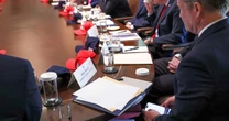 Photo appears to shows Mike Waltz using Signal-like app that can archive messages 