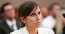 Lawyers for Utah grief author charged with fatally spiking husband's drink say key witness recanted