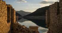 Sunken village emerges in Greece as drought dries up lake 