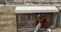 Photos: Israelis seek shelter as Iran launches retaliatory strikes