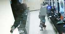 Video shows robbers drop into check cashing store from ceiling in $150,000 heist