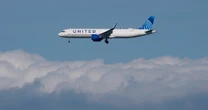 United flight rerouted after passenger tries to open door at 36,000 feet