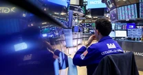 A soaring stock market led by tech has some likening the AI boom to the dot-com bubble