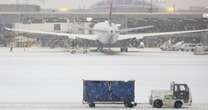 Delta passengers in Atlanta forced to evacuate plane on emergency slides amid winter storm