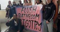 Transgender advocates stage a sit-in protest at a U.S. Capitol bathroom