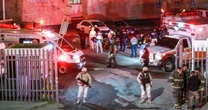 Report challenges official details of deadly fire at migrant center in Mexico
