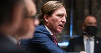 Former cyber official targeted by Trump quits company over move