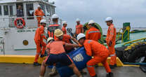 Race against time to clear oil spill in Philippines as Typhoon Gaemi wreaks havoc in Asia