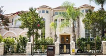 Couple in California surrogate case also faces two lawsuits over real estate business practices