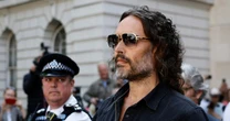 Russell Brand arrives at court to face rape and sexual assault charges