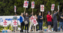 Boeing freezes hiring in sweeping cost cuts as it grapples with factory worker strike