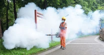 China battles mosquito-borne virus with Covid-era methods as U.S. issues travel warning