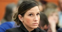 Grief author suspected of killing her husband indicted on new charges