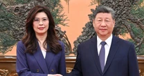 China's Xi talks peace with Taiwan's opposition leader even as Beijing raises military pressure
