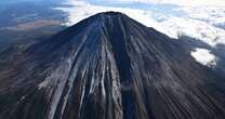 Mount Fuji finally gets its first snow, a month later than last year