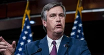 GOP Rep. Barry Moore exits through back door after he is heckled at Alabama town hall