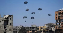 Israel allows new trickle of aid into starving Gaza amid mounting global criticism