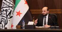 Why a photo of Syria’s interim new leader could hint at trouble ahead