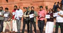 Opposition lawmakers protest alleged mistreatment of Indian deportees by U.S.